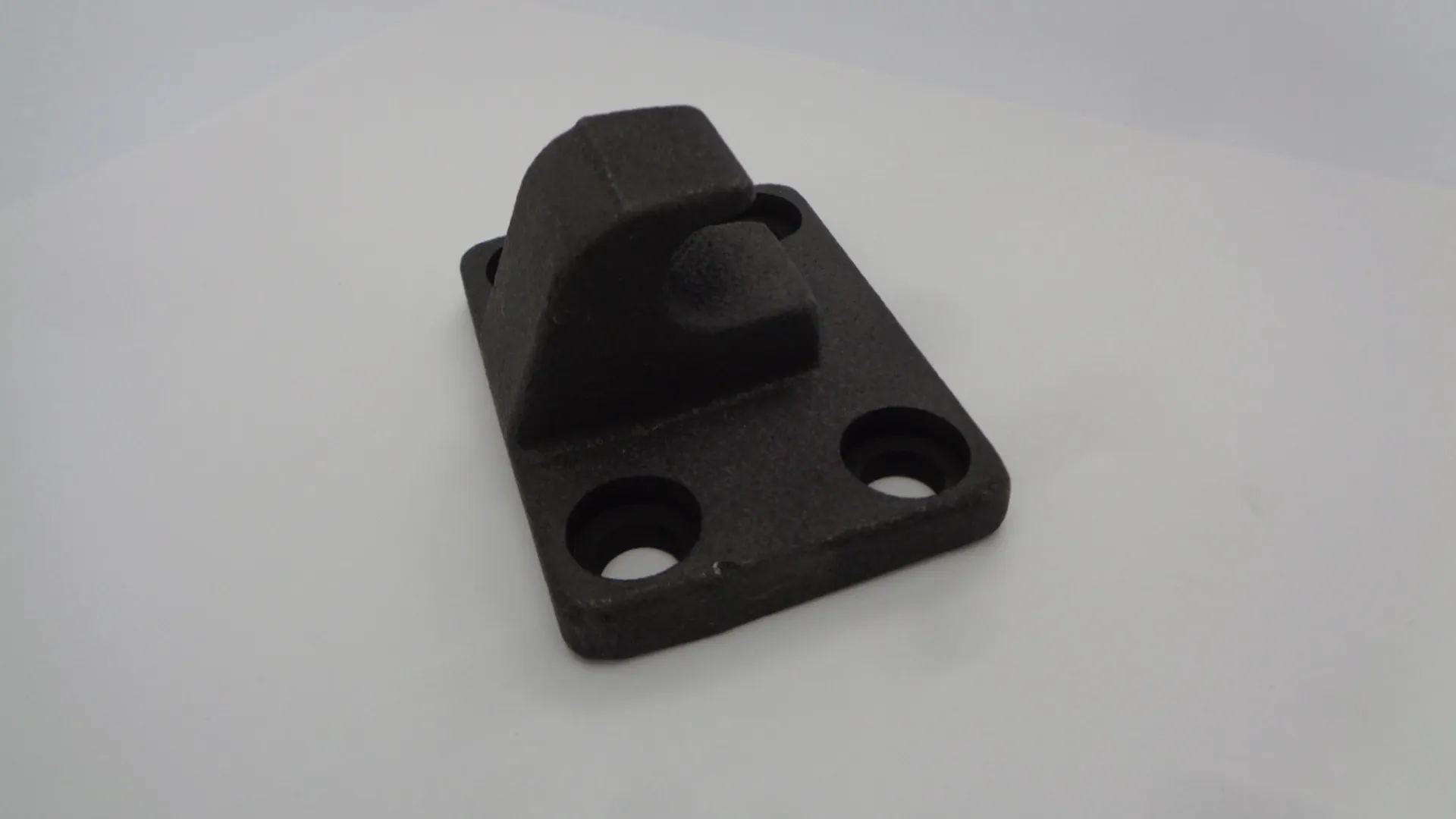 Black metal bracket with two screw holes and a hook.